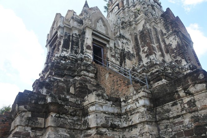 A Day in Ayutthaya: Private 5 UNESCO Temples Tour From Bangkok - Wat Ratchaburana, the restoration story behind the ruins