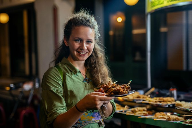 A Magical Evening in Bangkok: Private City Tour - The food and drink: one snack, plus smart picks that save you money