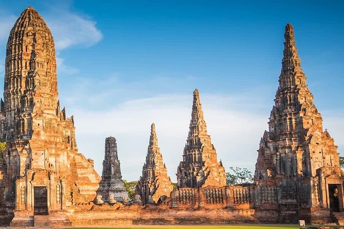 Afternoon Ayutthaya heritage site & River Boat Ride at Sunset - The cruise pass-by moments: Wat Phanan Choeng and fish-feeding calm