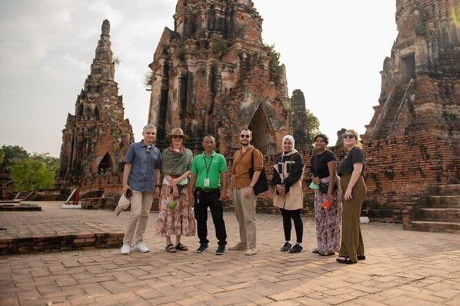 Ayutthaya, Damnoen Floating & Maeklong Railway Market Day Tour - Mae Klong Railway Market: Watch the Stalls Close in Seconds