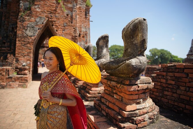 Ayutthaya Day Tour By Coach and Cruise - Stop 2 on your map: the Pasak River cruise and buffet lunch that breaks up the temples