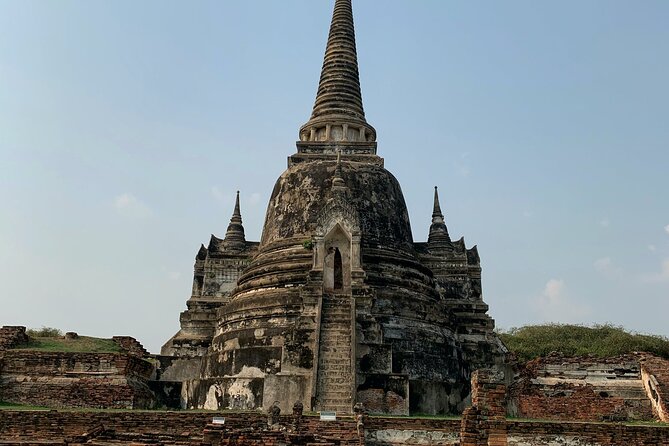 Ayutthaya Sunset Join Tour, Boat Ride, Famous Spot & Local Market - Wat Mahathat: where the relic story is the whole point