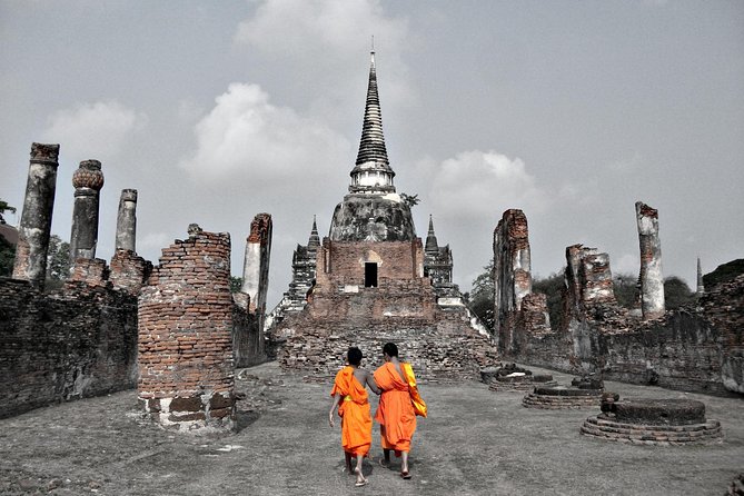 Ayutthaya Sunset Tour: Iconic Temples & Scenic River Boat Ride - Chao Praya Sunset Boat Ride and Cruise Pass-By Sights