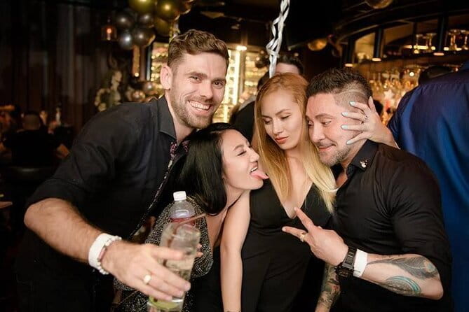 Bangkok After Dark: Pub Crawl Adventure - Juicy live music: charades and the energy shift toward dancing