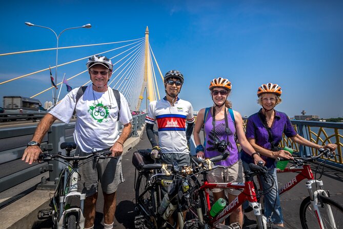 Bangkok: Backstreets and Temple Historic Bike Tour - Discova Shop, Sam Yot Meeting, and Temple-Ready Clothing