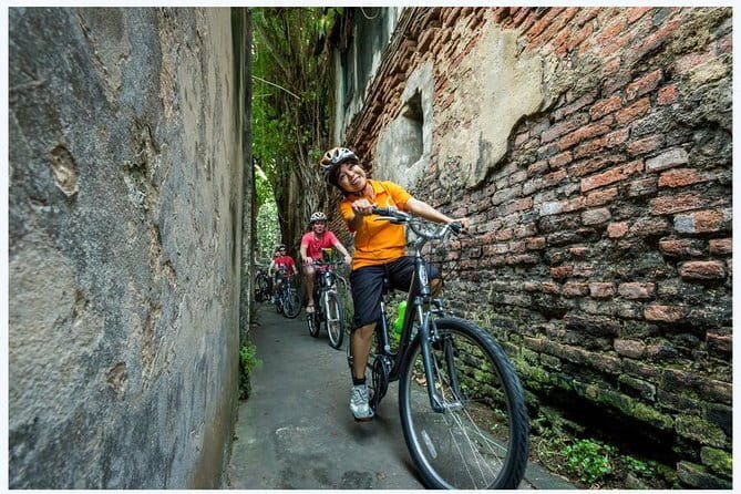 Bangkok: Bike and Longtail Boat Tour with Lunch - Wutthakat: a calm neighborhood stop between old and new
