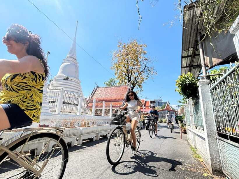 Bangkok: Bike, Boat & Food Tour in Thonburi - Temple time that’s short, guided, and practical: Wat Paknam Phasi Charoen and Wat Khun Chan