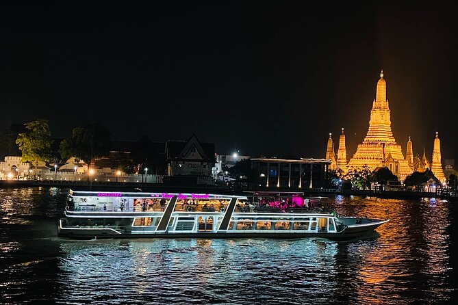 Bangkok Chao Phraya River Sunset Cruise Tour Admission Ticket - Wat Arun at night: the landmark that sells the whole evening