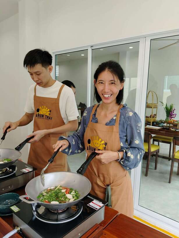 Bangkok: Cooking Class + Tuk Tuk Ride + Market Tour - Cooking 4 dishes at a clean, spacious kitchen station