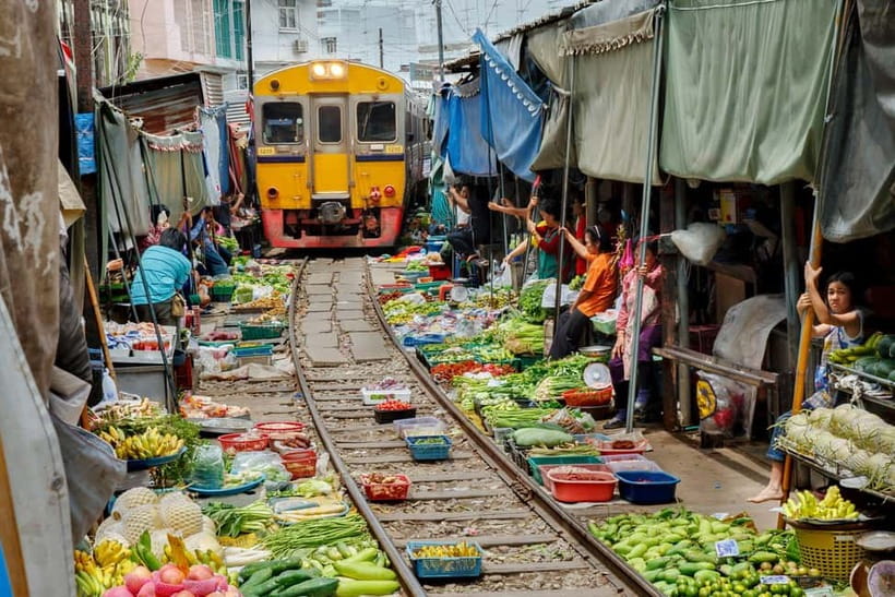Bangkok: Famous Markets and Dragon Temple Guided Day Tour - Maeklong Railway Market: watching vendors reset the scene in seconds