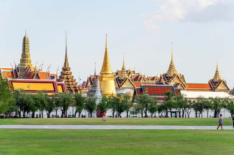 Bangkok: Grand Palace, Wat Pho, and Wat Arun Guided Tour - Wat Arun across the river: porcelain prang and the climb for big views