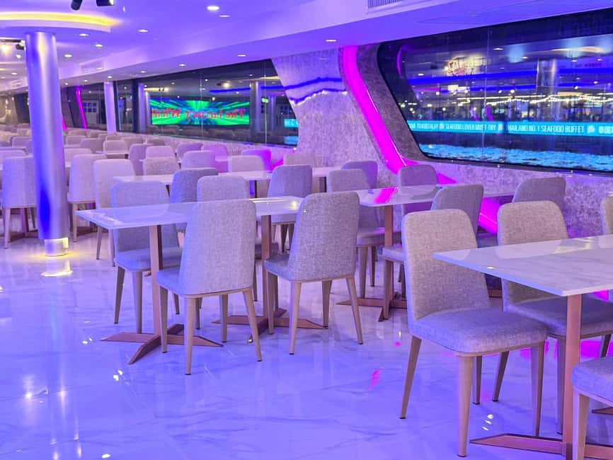 Bangkok: Luxury White Sunset or Dinner Cruise with Beer - Comfort, seating, and the smart-casual reality on a river boat