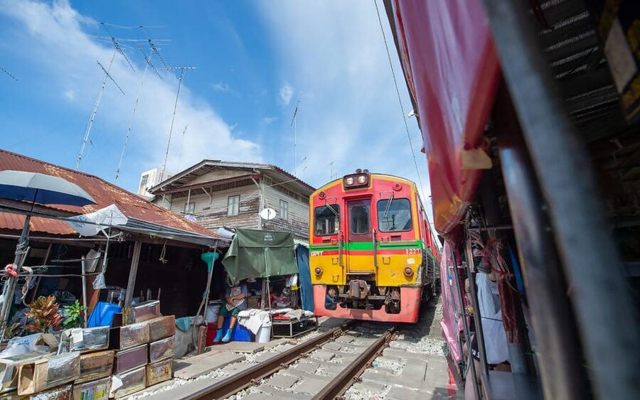 Bangkok: Maeklong Railway Market and Amphawa Floating Market - Maeklong Railway Market, where the train owns the schedule