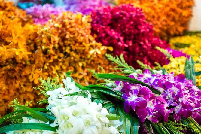 Bangkok: Night Bike Tour with Temples & Flower Market Visit - Rama VIII Bridge views and the Thammasat University stretch