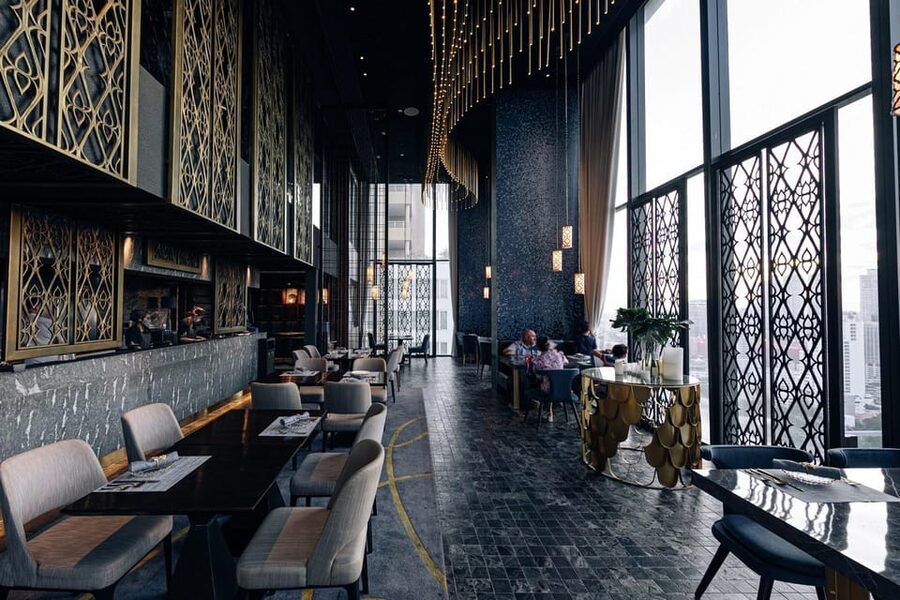 Bangkok: Nimitr Rooftop by 137 Pillars - Rooftop vibe and seating: open-air feelings, enclosed comfort