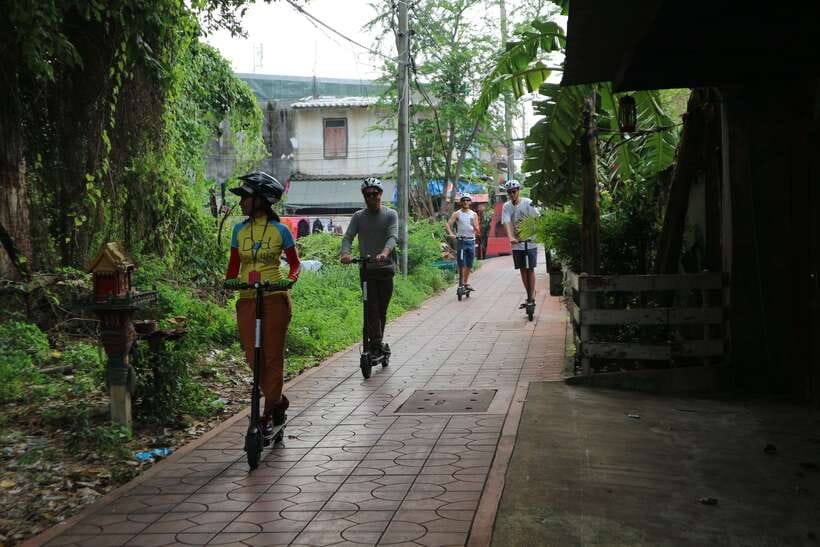 Bangkok: Riverside E-Scooter Adventure with StreetFood Snack - Thonburi fruit market and narrow alley riding that feels local