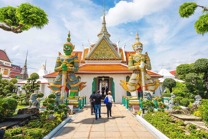 Bangkok Temples Tour at Wat Arun, Wat Phoa and Wat Saket - Wat Arun Temple of Dawn: riverboat ride and white spires for photos