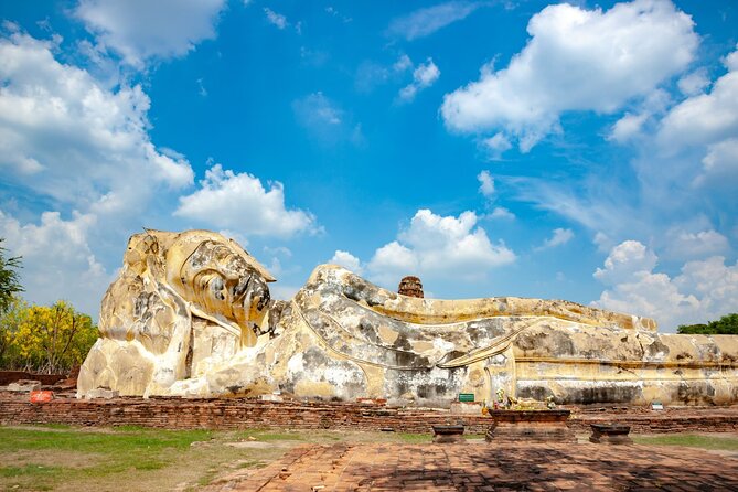 Bangkok to Ayutthaya: Temples & Local Candy One Day Tour - Wat Yai Chai Mongkhon’s chedi and reclining Buddha: scale and calm