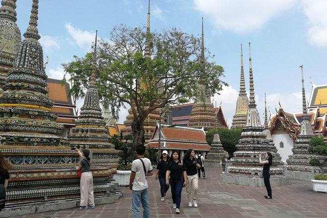 Bangkok Tour: Highlights & Hidden Gems & Long Tail Boat - Stop 4: Wat Phra Chetuphon (Wat Pho), the reclining Buddha complex