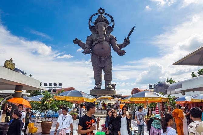 Chachoengsao One Day Trip from Bangkok : Historic Market and Buddhist Temples - Wat Saman Rattanaram: The Giant Pink Ganesha Temple by the Bang Pakong River