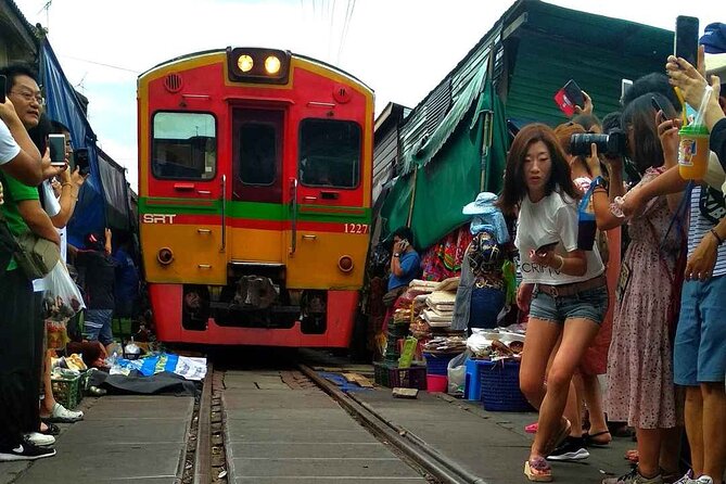 Damnoen Saduak Floating Market & Maeklong Train Market Tour - Price and what you get for about $125.79