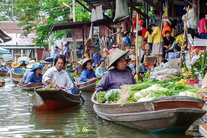 Damnoen Saduak Floating Market & Maeklong Train Market Tour - Transportation pacing: how the day can feel fast