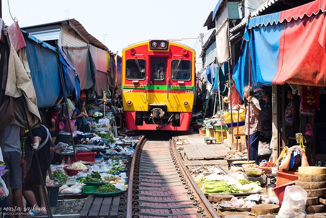 Damnoen Saduak Floating Market & Maeklong Train Market Tour - Maeklong Train Market: watching the market react to the train