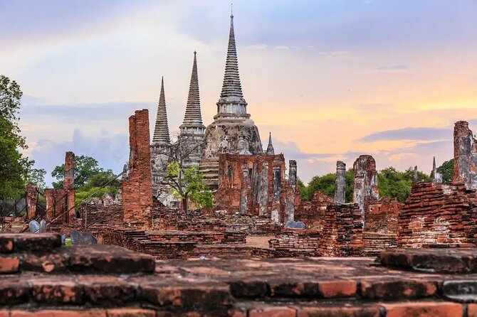 Day Tour of Ayutthaya and Bang Pa In - Wat Mahathat Tree Buddha and lunch at midday