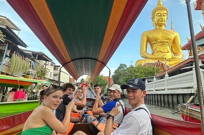 Discover Hidden Bangkok with Longtail Boat Tour - The water-view moments: Wat Paknam Big Buddha and Wat Raja Oros