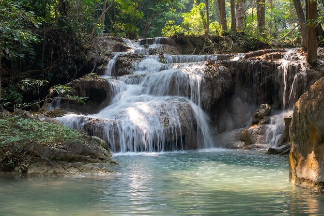 Erawan Waterfalls and Bridge Over River Kwai Tour from Bangkok - Bridge over the River Kwai: the Death Railway stop that anchors the story