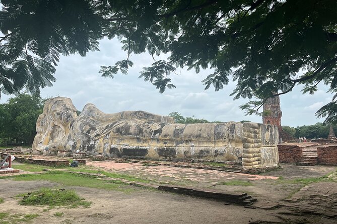 Explore Ancient Ayutthaya Historical Park Day Tour in Bangkok - Wat Mahathat: the Buddha head in tree roots, short visit but big impact
