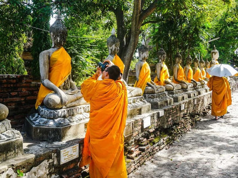 From Bangkok: Ayutthaya Heritage Tour with Sunset Boat Ride - Wat Maha That’s Buddha head in tree roots