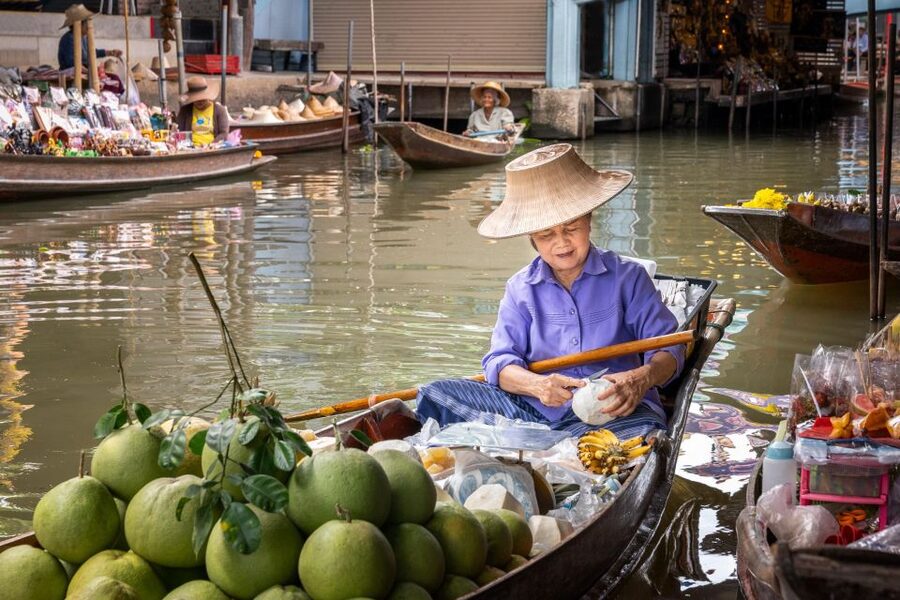 From Bangkok: Railway & Damnoen Saduak Floating Market Tour - Baan Tao Thai Derm: Sugar Palm, Coconut Plantation Work, and a Home Stop