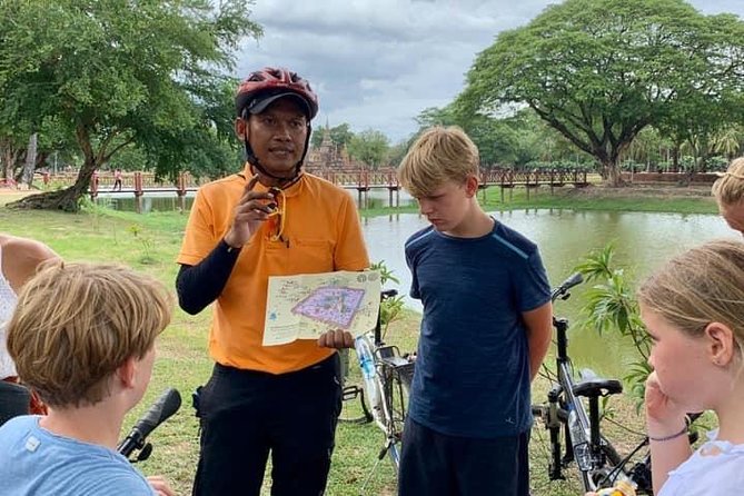 Full Day Cycling tour to Sukhothai Historical Park - Entering Sukhothai Historical Park with a guided temple route