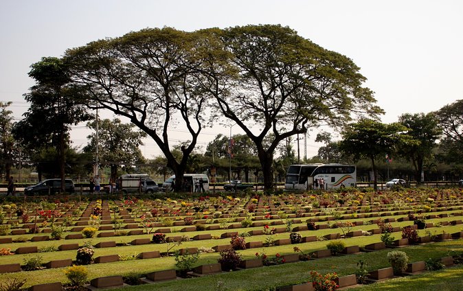 Full-Day Kanchanaburi River Kwai & Death Railway Private Tour - Kanchanaburi War Cemetery: reading names at eye level