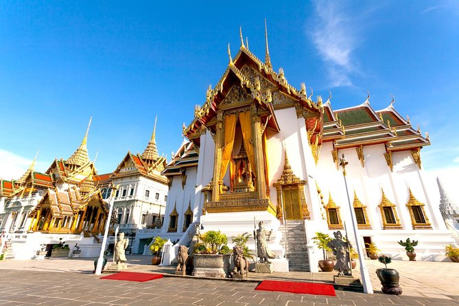 Grand Palace, Damnoen Floating Market & Maeklong Railway Market Tour – Full Day - Damnoen Saduak Floating Market: boat time and river-side pace