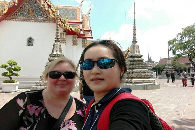 Half-Day Bangkok City Tour with The Grand Palace Private - Wat Pho Chai (Wat Pho) and the Reclining Buddha, up close