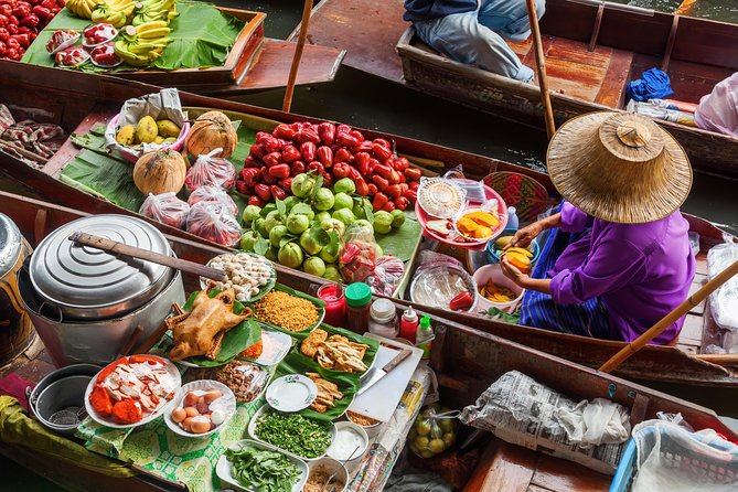 Half-Day Damnoen Saduak Floating Market Small Group Tour - Buying snacks and bargaining on board without the stress