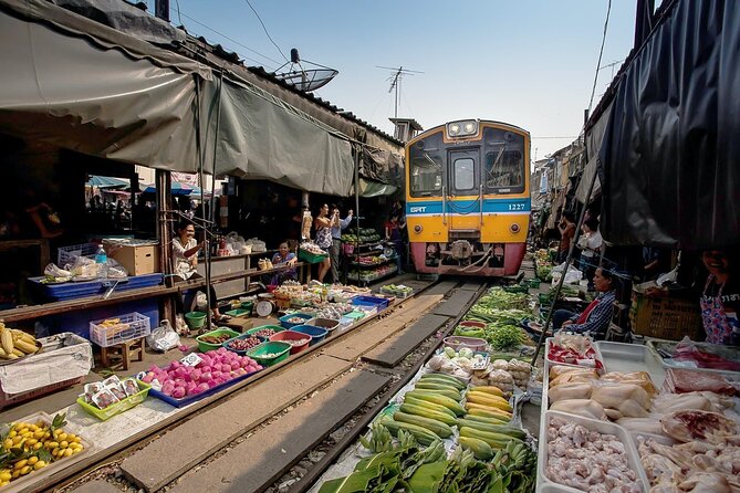 Half Day Railway Market and Damnoen saduak Floating Market tour - Markets Outside Bangkok: Why This Half-Day Duo Works