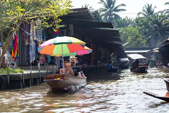 Half Day Railway Market and Damnoen saduak Floating Market tour - Hiring a Small Boat: How to Turn Watching Into Browsing