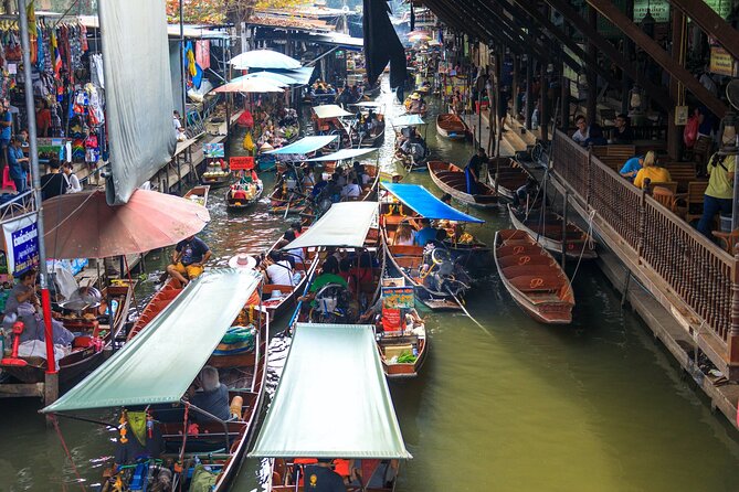 Half Day Railway Market and Damnoen saduak Floating Market tour - Maeklong Railway Market: Watching Vendors Reset the Moment the Train Comes