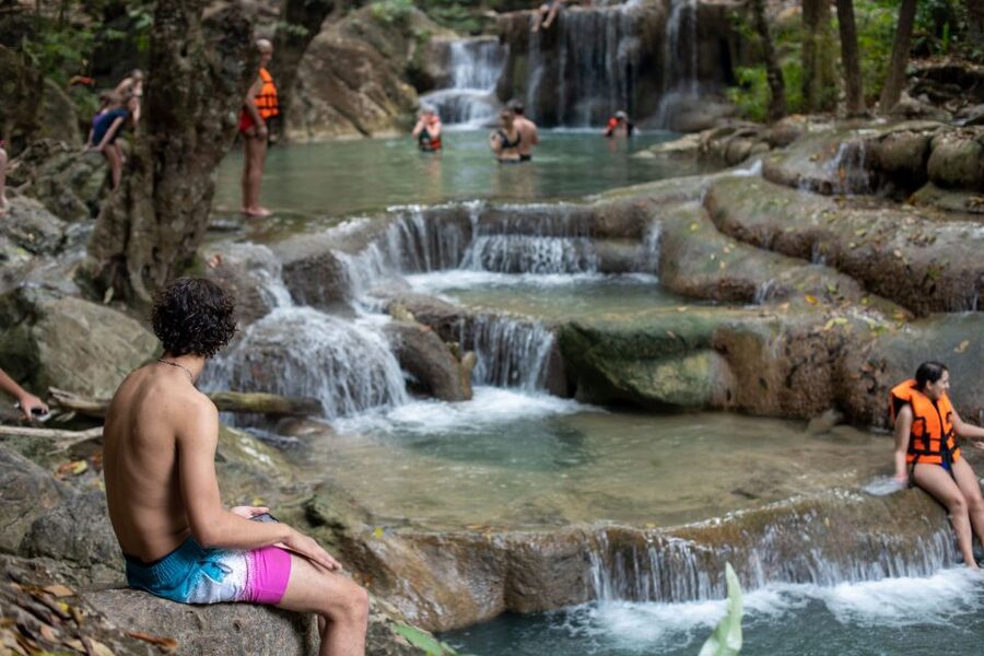 Kanchanaburi: Erawan Waterfall & Train Full-Day Tour - Quick swim, caves, and what to bring for Erawan