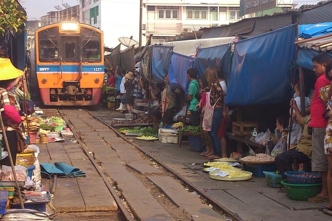 Maeklong & Damnoen Saduak Markets: Railway & Floating Market Tour - Mae Klong Railway Market: The Train-Through Moment You Cannot Fake