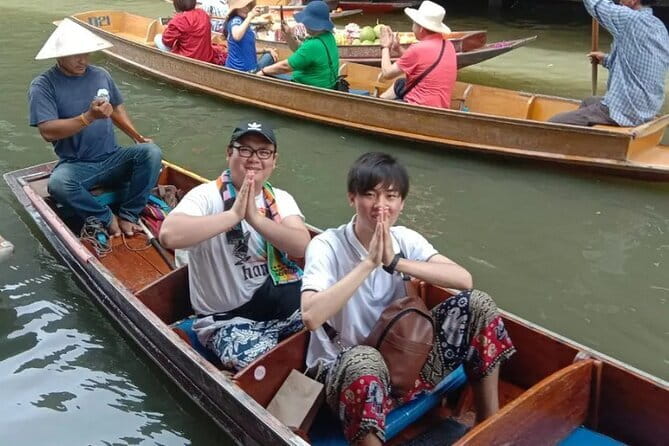 Maeklong Railway and Damnoen Saduak Floating Market Tour - Guide quality is the difference between watching and understanding