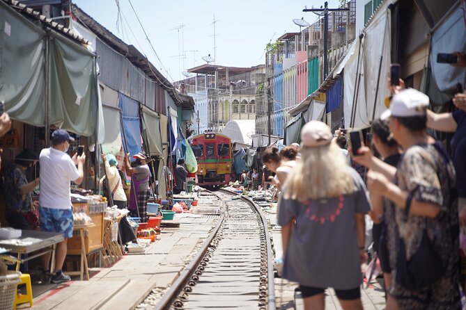 Maeklong Railway Market and Floating Market - The train moment: when you should plan to move fast