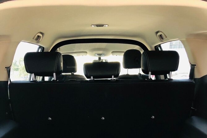 Private 100% Electric Transfer: Bangkok Airport Pickup/Drop-Off - Onboard Perks: Water, Wi-Fi, and a Clean Electric Car