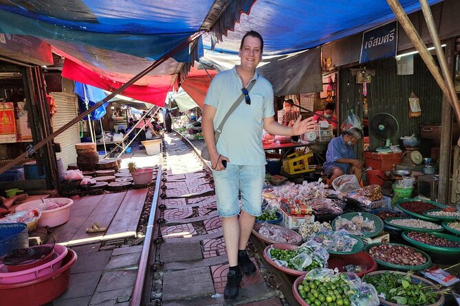 Private Amphawa & Maeklong Railway Market Day Tour with Fireflies - Mae Klong Railway Market: why the train moment is the main event