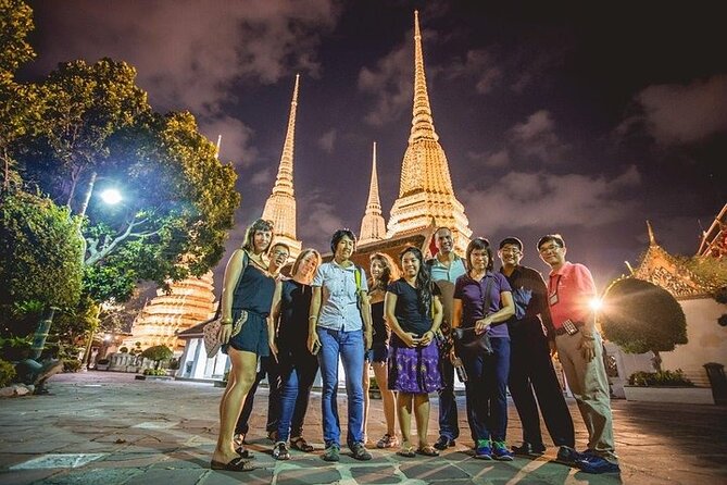 Private Bangkok Night City Tour by Tuk-Tuk with Thai Food - Wat Arun after dark: the Temple of Dawn glow