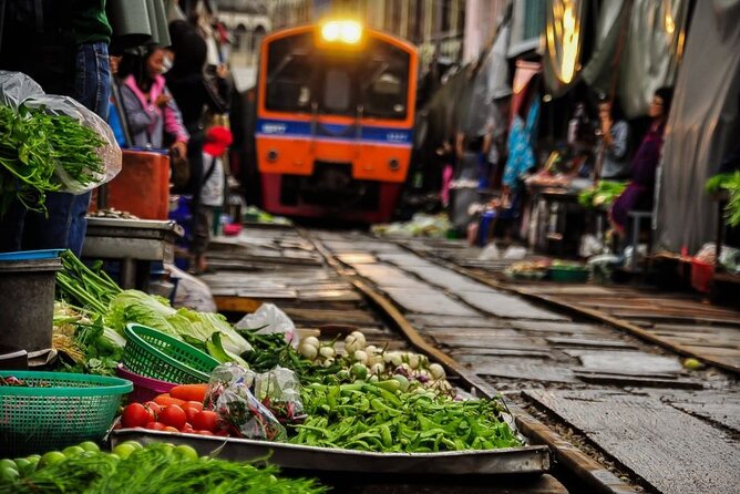 Private Damnoen Saduak and Maeklong Railway Market Tour(min 2pax) - Staff and vehicle quality: what the reviews emphasize