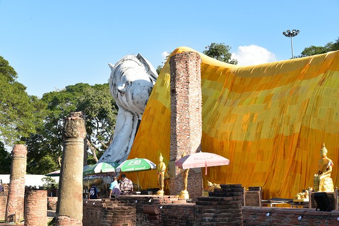 Private Excursion to Ayutthaya, World Heritage site and Ang-Thong Discovery - Wat Mahathat: the tree roots and the Buddha head